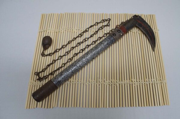 Kusarigama ninja weapon with curved sickle and long chain