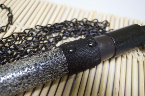 Kusarigama ninja weapon with curved sickle and long chain