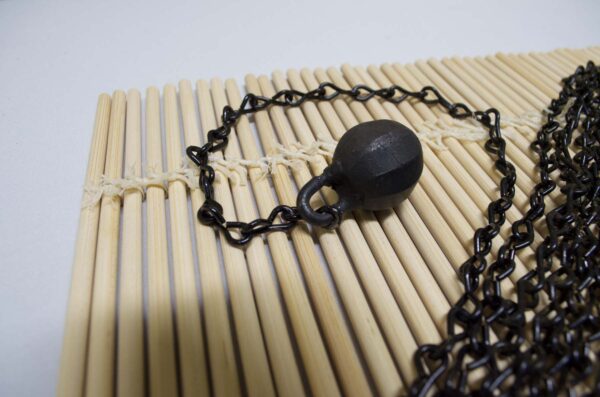 Kusarigama ninja weapon with curved sickle and long chain