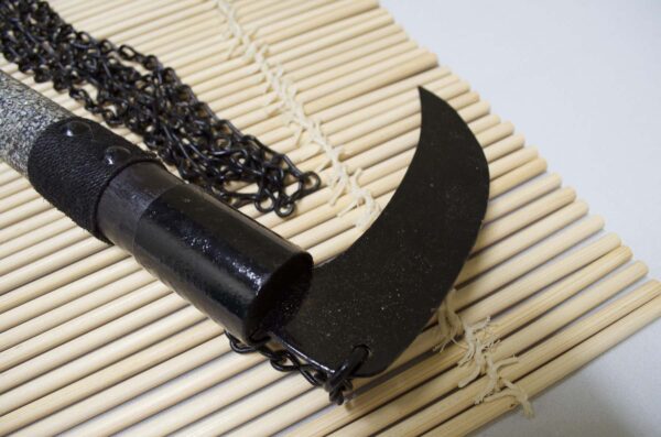 Kusarigama ninja weapon with curved sickle and long chain